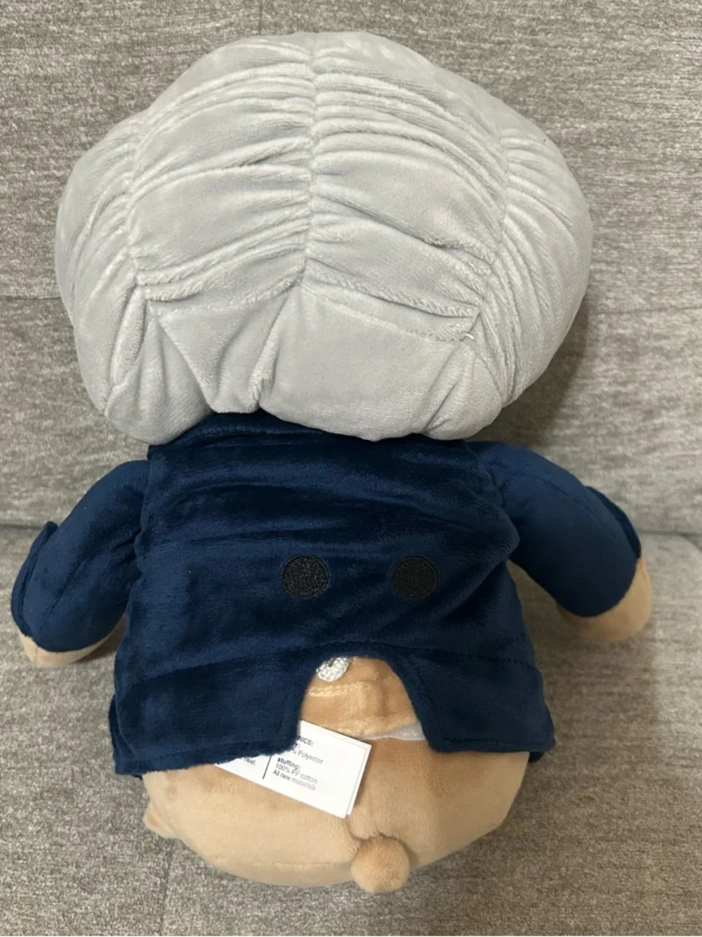 Plush Lion in Navy Jacket with Red Scarf